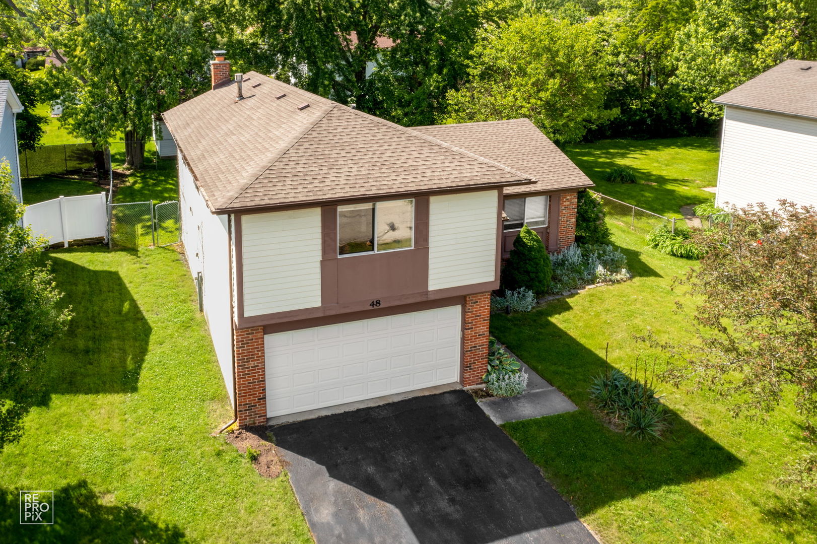48 Pheasant Road Matteson, IL 60443 - Photo 3 of 23 a aerial view of a house with a yard