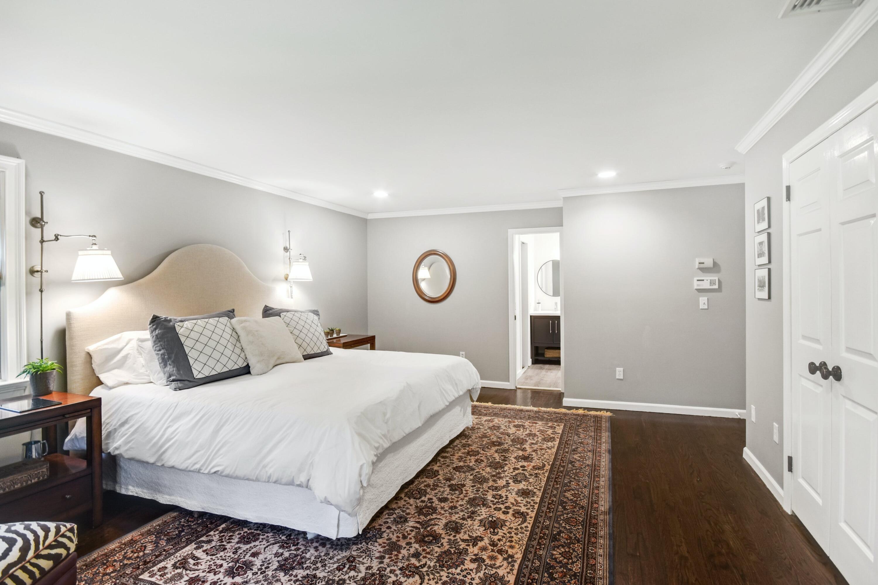 181 Brushy Ridge Road New Canaan, CT 06840 - Photo 15 of 34 a bedroom with a bed and a table