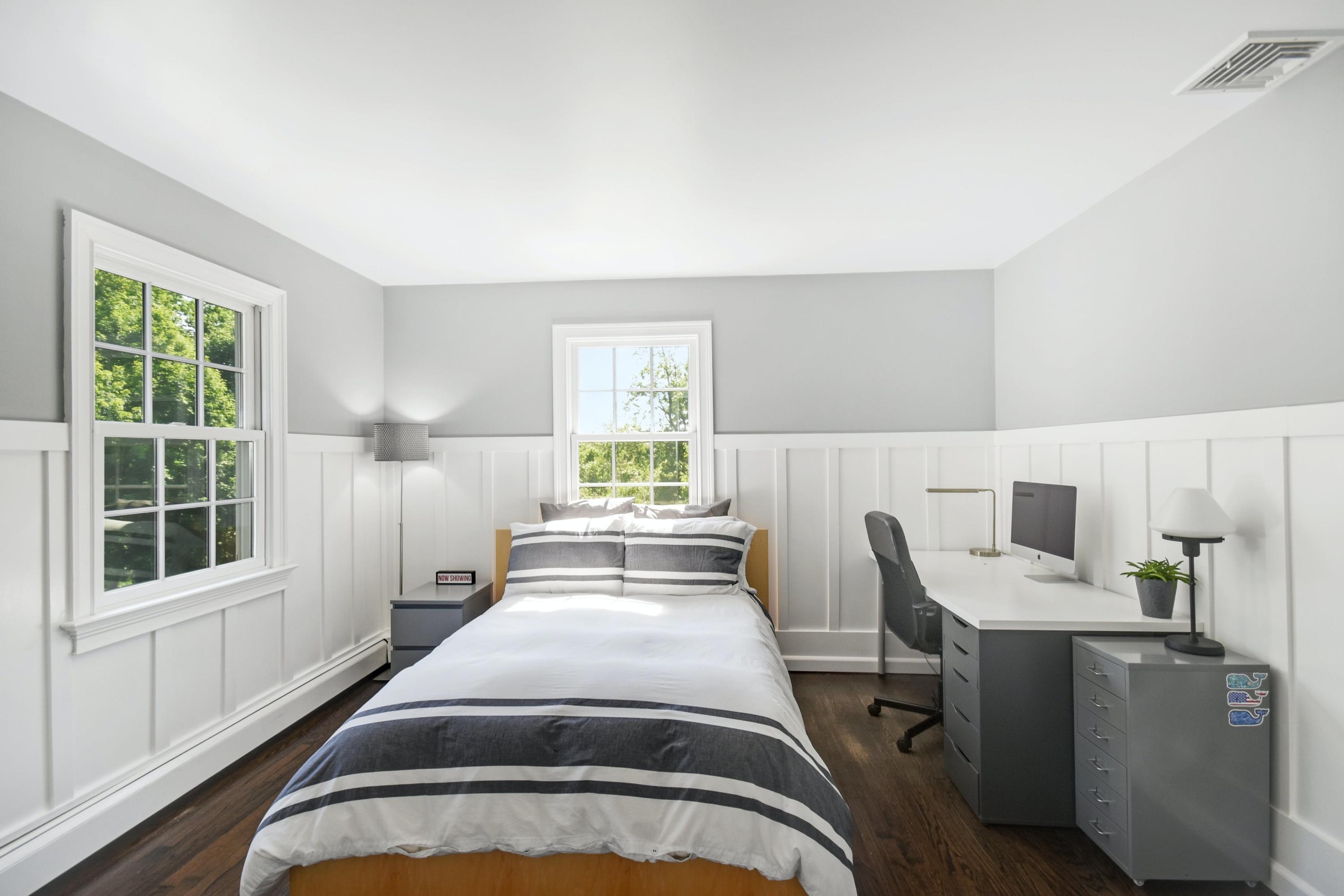 181 Brushy Ridge Road New Canaan, CT 06840 - Photo 18 of 34 a bed room with a bed and a window