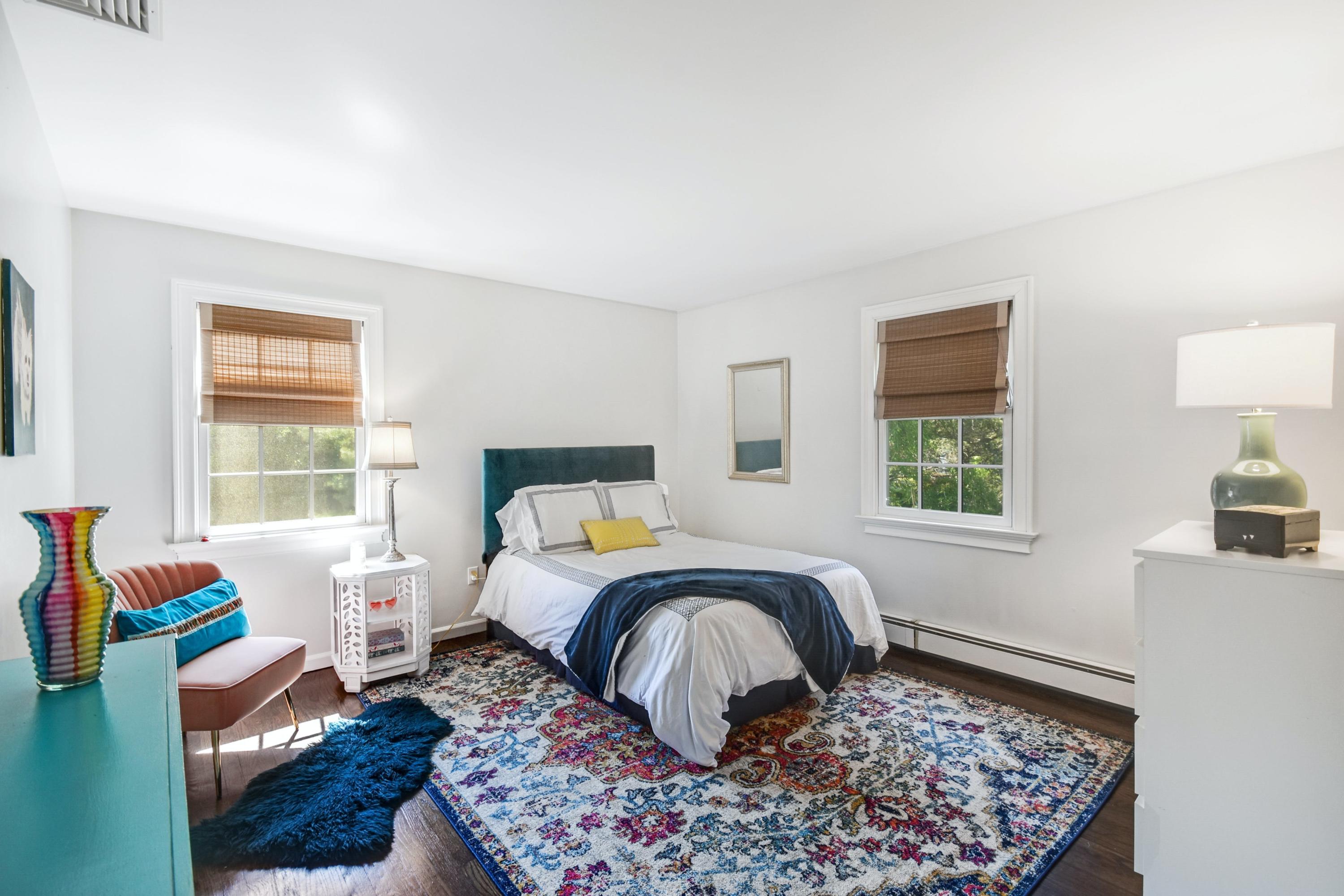 181 Brushy Ridge Road New Canaan, CT 06840 - Photo 19 of 34 a bed room with a bed and a couch