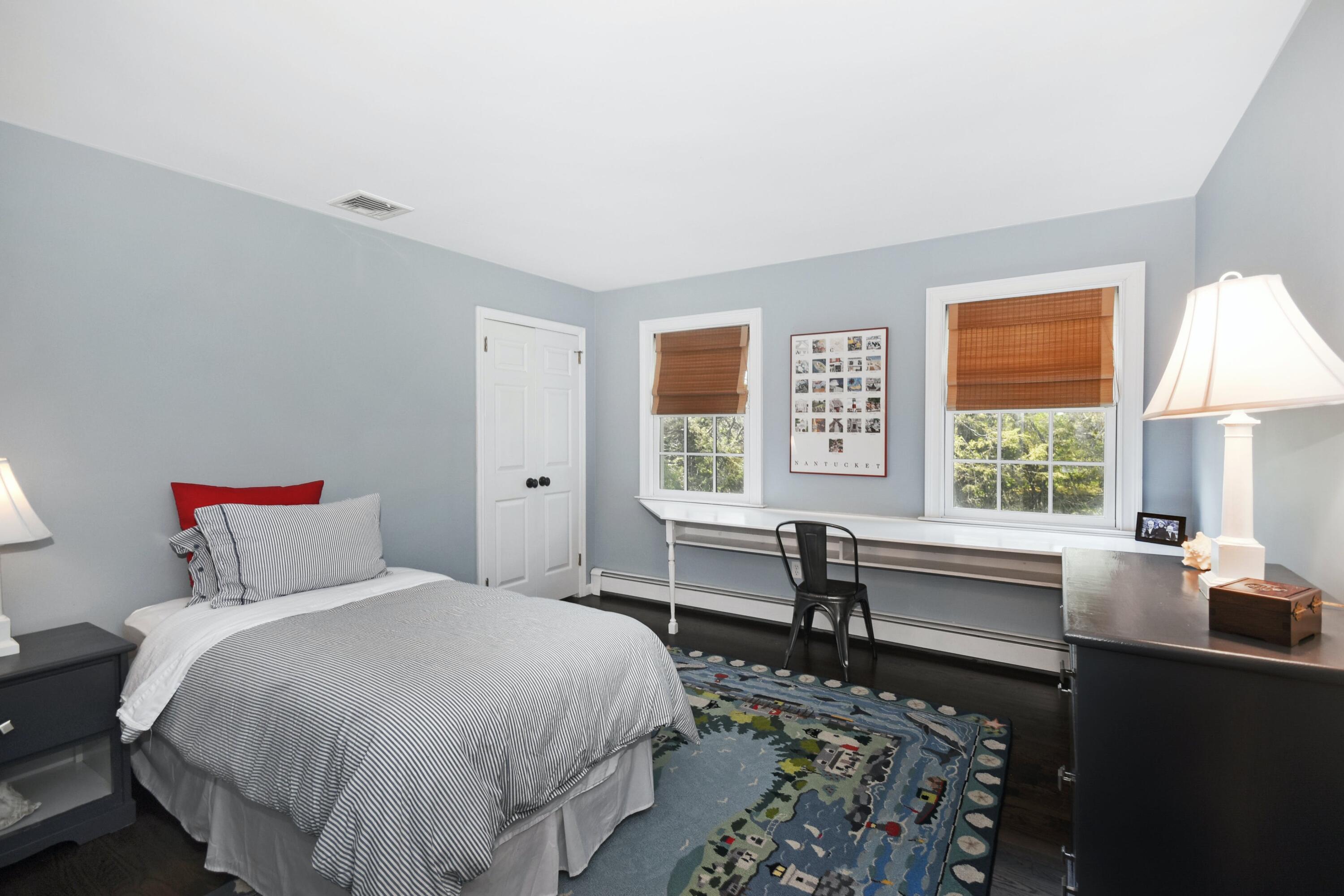 181 Brushy Ridge Road New Canaan, CT 06840 - Photo 20 of 34 a bedroom with a bed and a window