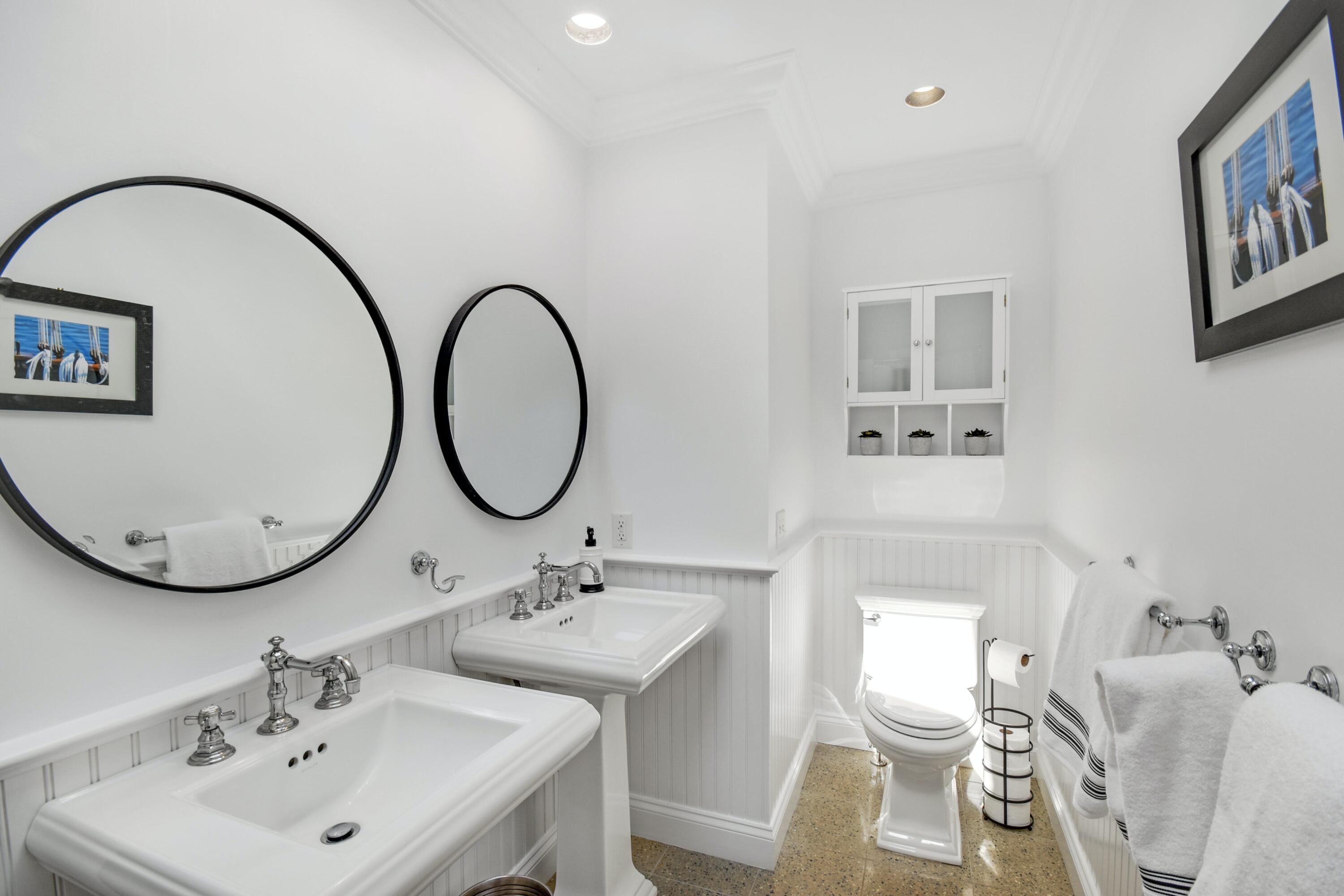 181 Brushy Ridge Road New Canaan, CT 06840 - Photo 21 of 34 a bathroom with a sink mirror and toilet