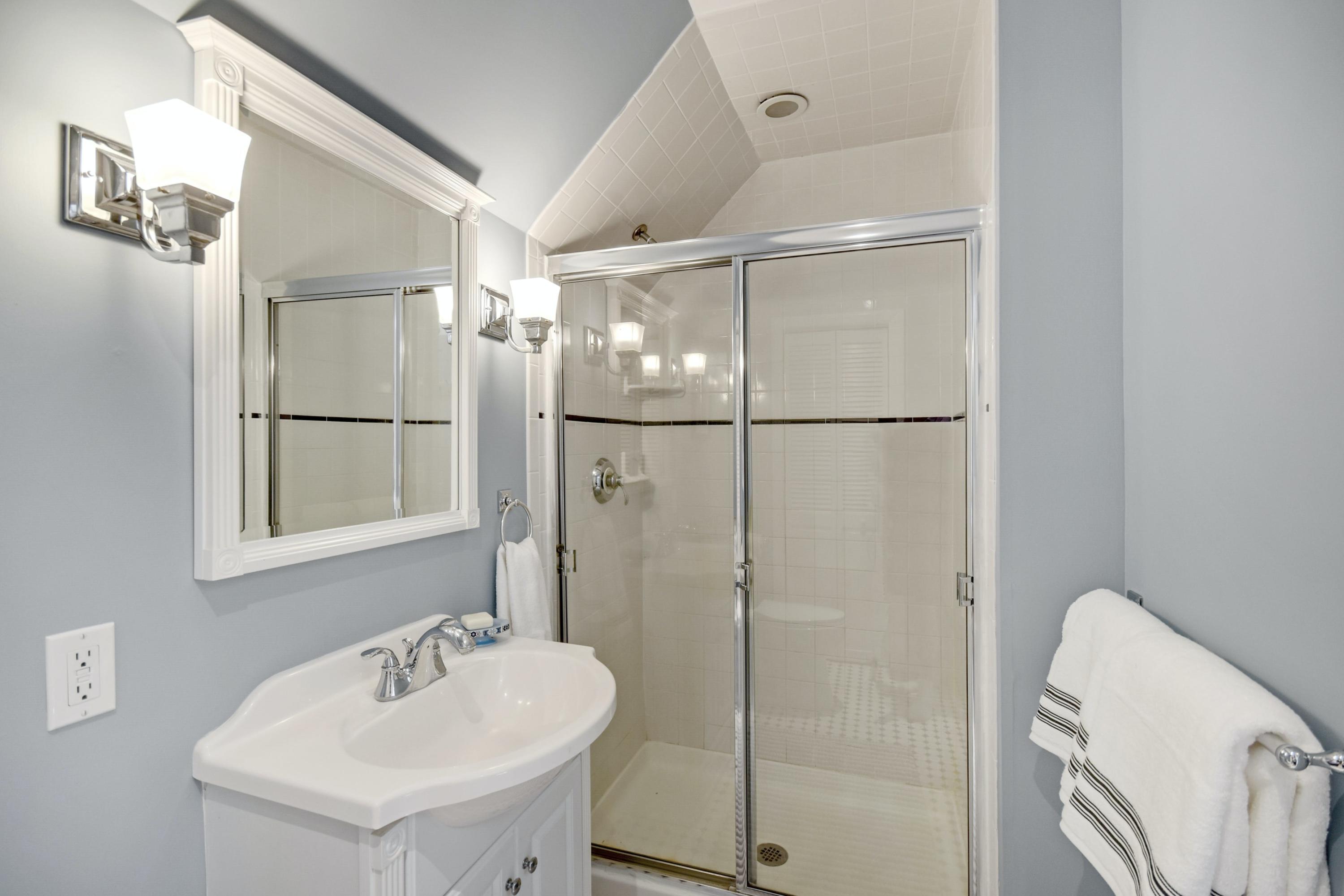181 Brushy Ridge Road New Canaan, CT 06840 - Photo 23 of 34 a bathroom with a sink toilet and shower