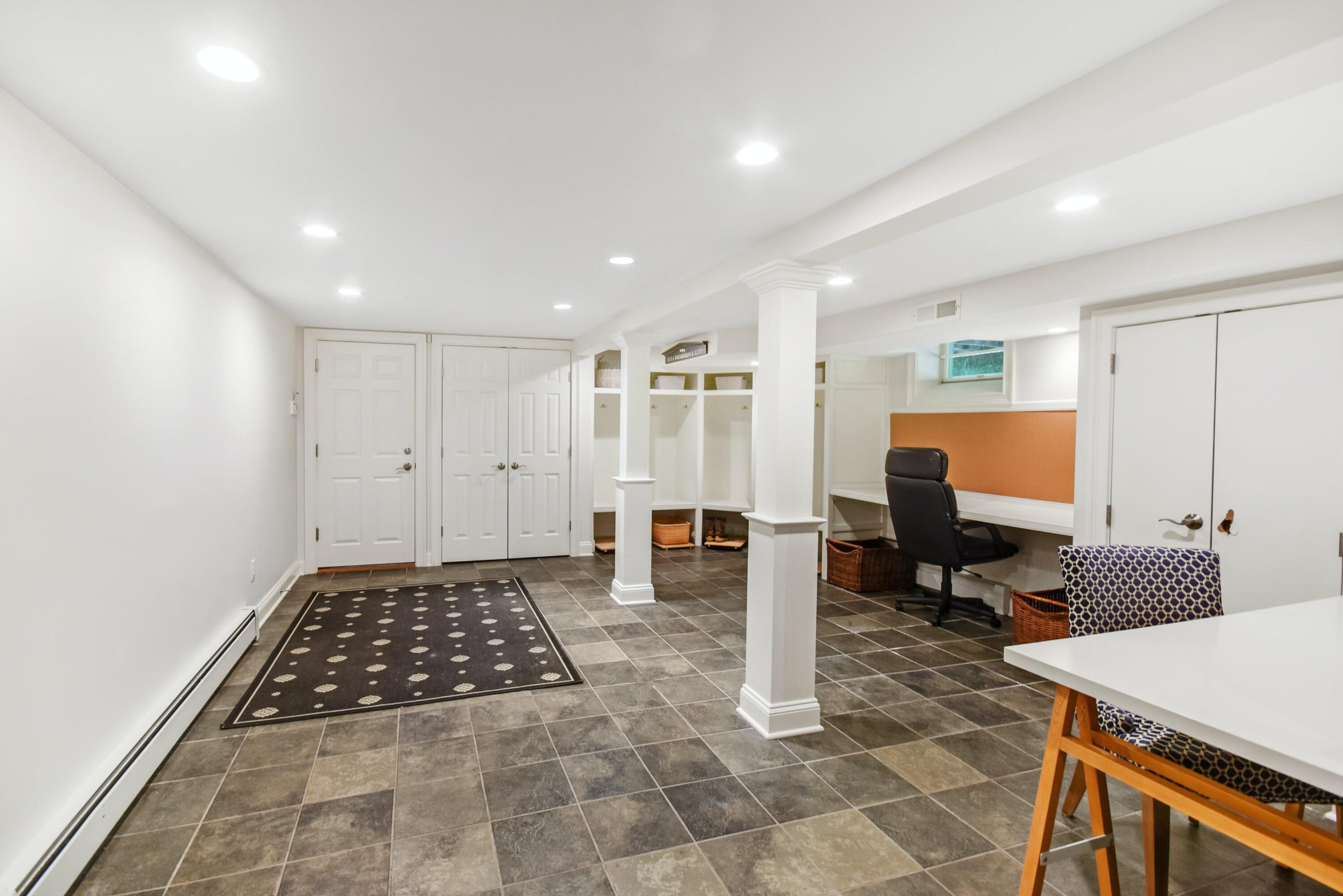 181 Brushy Ridge Road New Canaan, CT 06840 - Photo 24 of 34 a living room with furniture and a window