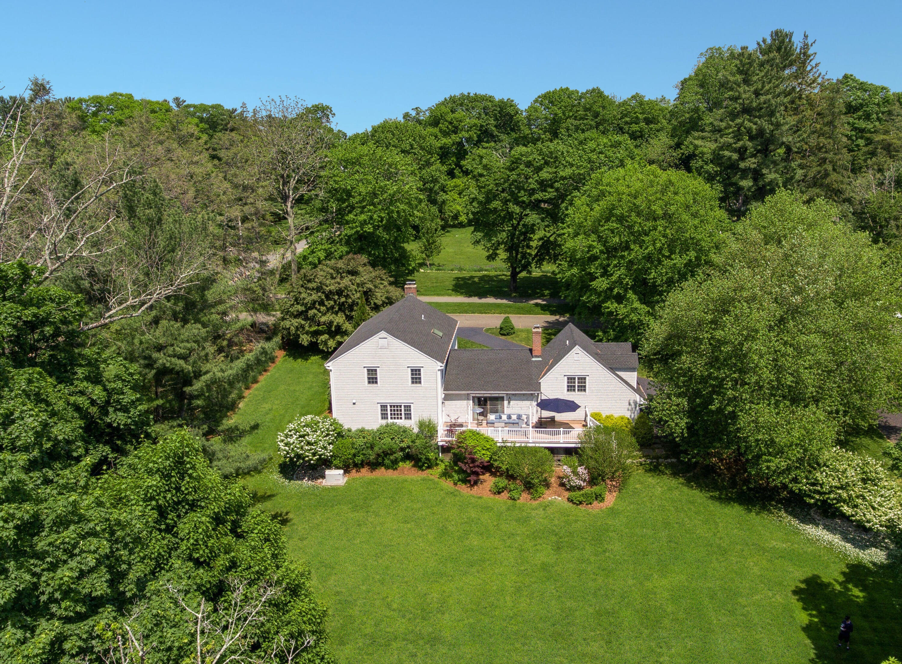 181 Brushy Ridge Road New Canaan, CT 06840 - Photo 30 of 34 an aerial view of a house with a big yard