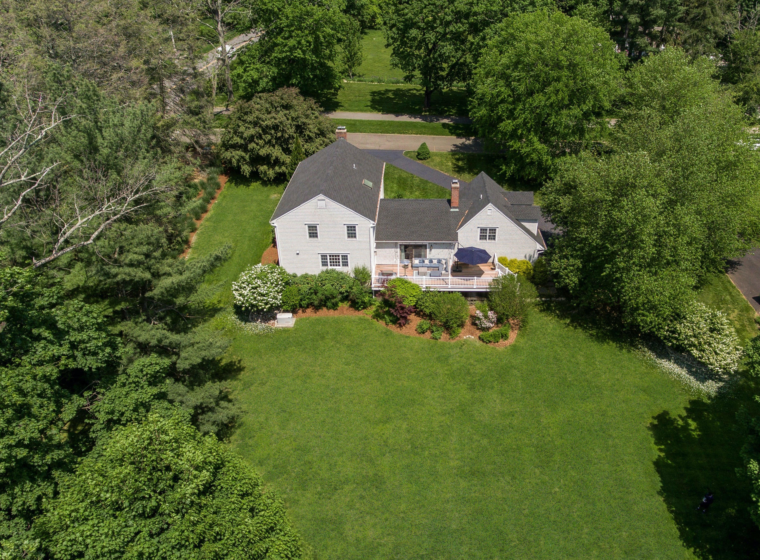 181 Brushy Ridge Road New Canaan, CT 06840 - Photo 32 of 34 an aerial view of a house