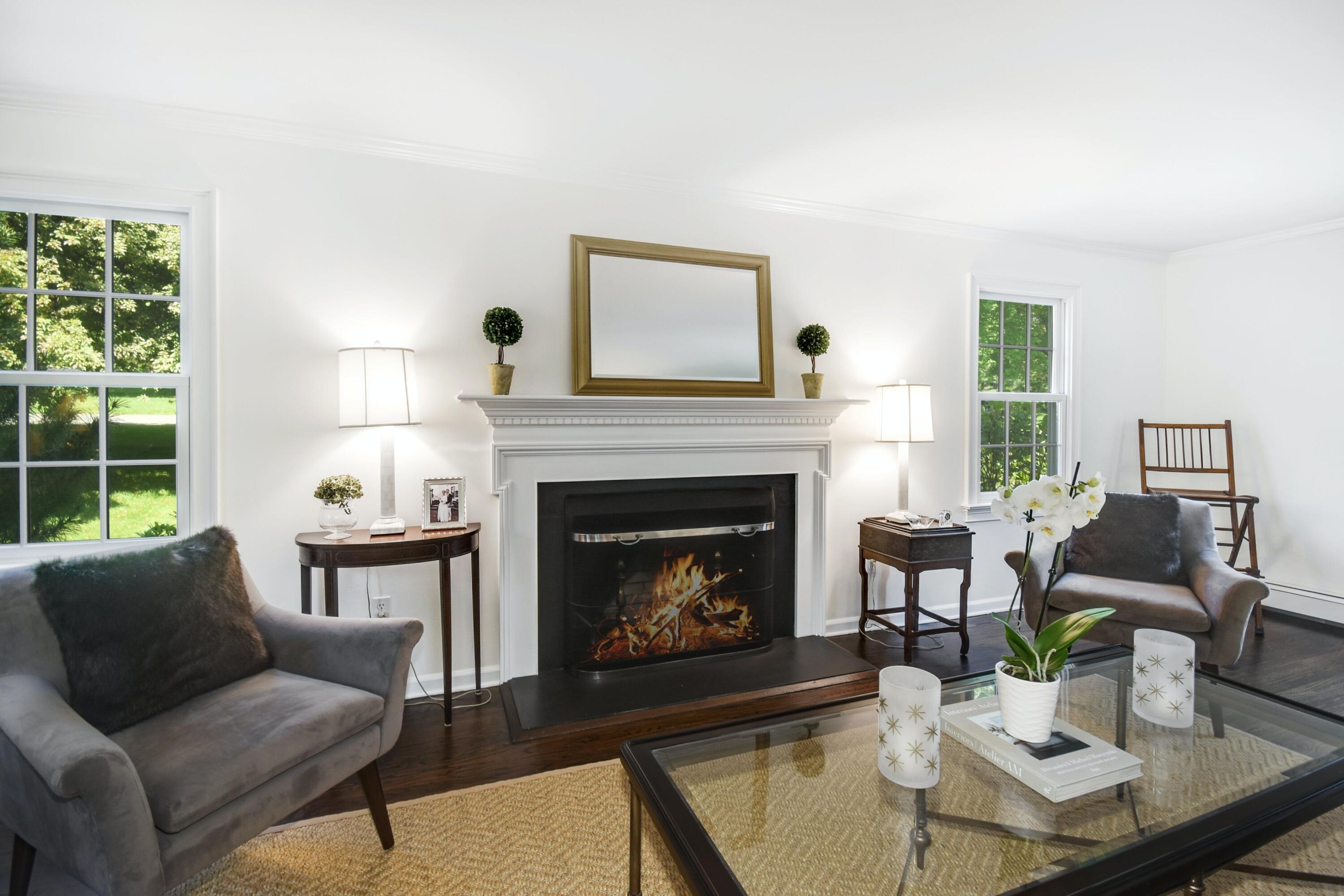 181 Brushy Ridge Road New Canaan, CT 06840 - Photo 5 of 34 a living room with furniture and a fireplace