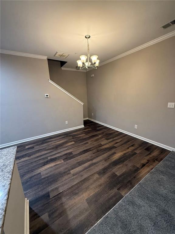 3369 Hidden Stream Court Stockbridge, GA 30281 - Photo 3 of 13 a view of a chandelier in an empty room