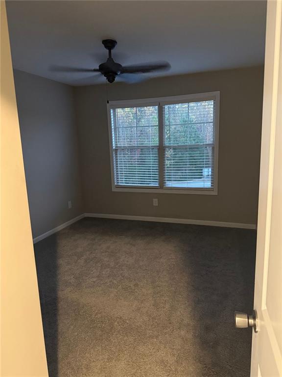 3369 Hidden Stream Court Stockbridge, GA 30281 - Photo 8 of 13 an empty room with a window