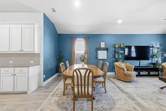 a view of a dining room with furniture