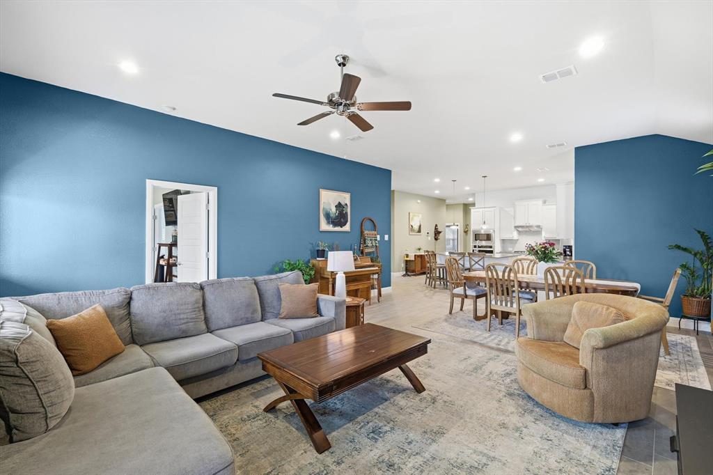 2213 Ruff Road Denton, TX 76205 - Photo 21 of 38 Large living space with ceramic tile flooring and custom paint.