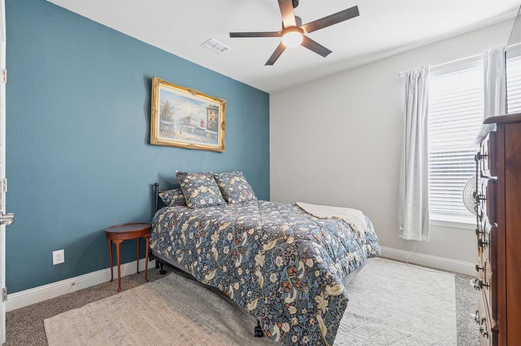 2213 Ruff Road Denton, TX 76205 - Photo 5 of 38 Guest bedroom located off the front of home.