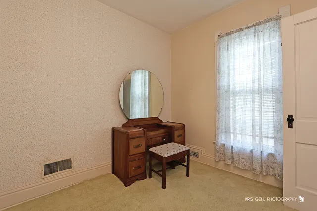 a room with furniture and a window