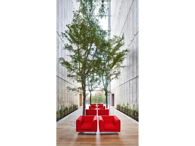 a building exterior with furniture