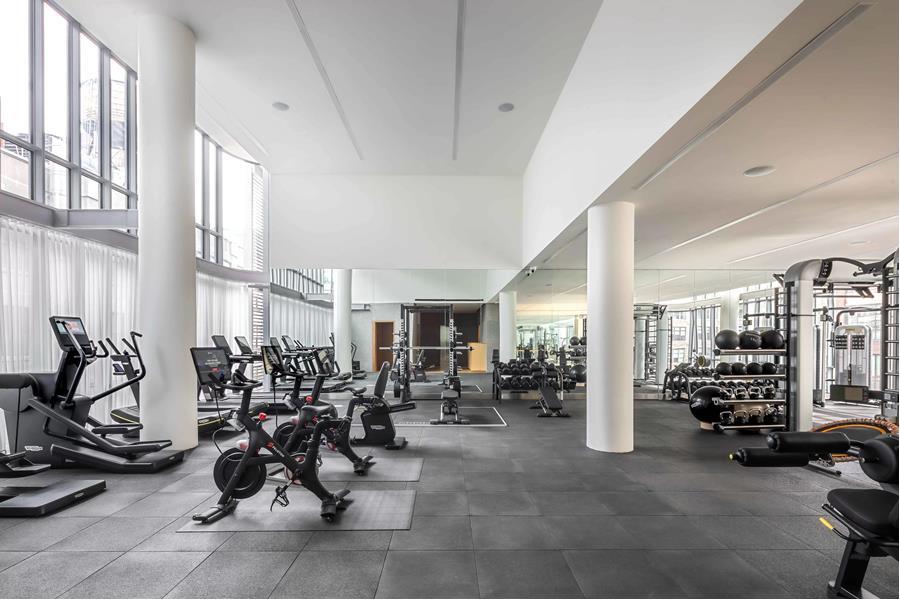 565 Broome Street, Unit N27B Manhattan, NY 10013 - Photo 18 of 22 a view of a room with gym equipment