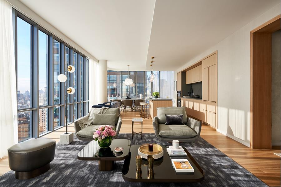 565 Broome Street, Unit N27B Manhattan, NY 10013 - Photo 7 of 22 a living room with furniture and a flat screen tv