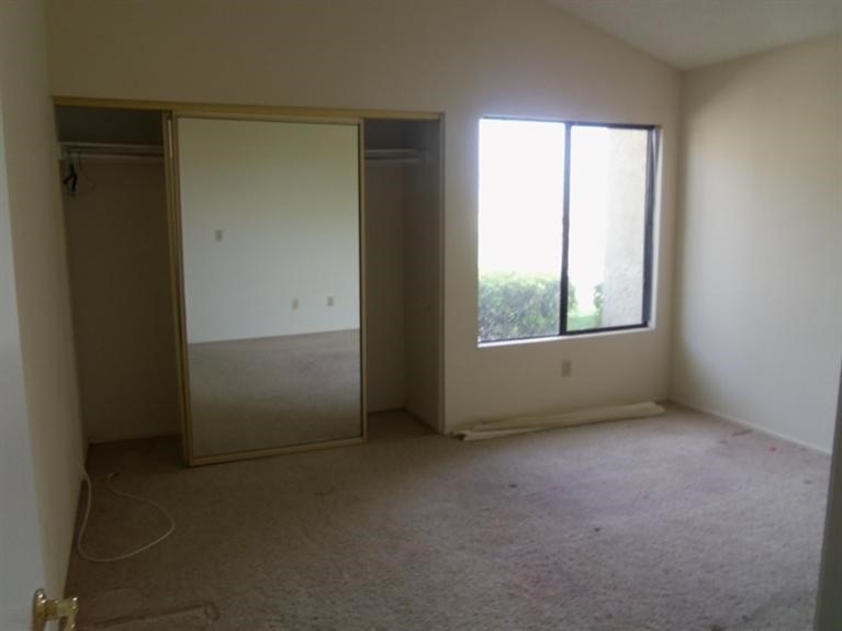 14736 Chaparral Lane, Unit 1 Helendale, CA 92342 - Photo 5 of 5 an empty room with windows