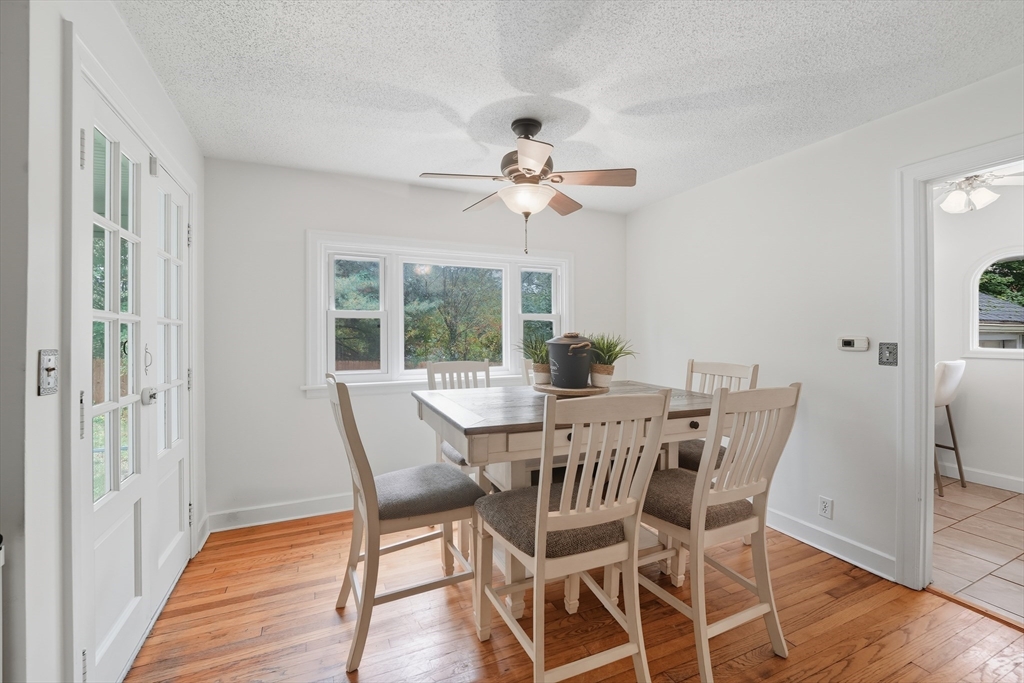 75 Carnavon Circle Springfield, MA 01109 - Photo 8 of 18 a view of a dining room with furniture window and wooden floor