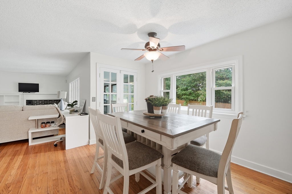 75 Carnavon Circle Springfield, MA 01109 - Photo 9 of 18 a view of a dining room with furniture window and wooden floor
