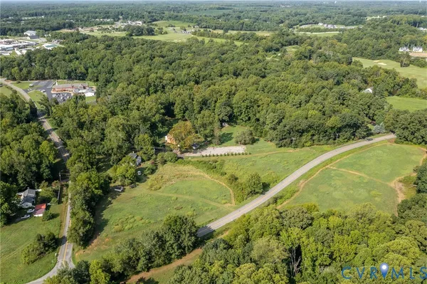 a view of a yard with an outdoor space