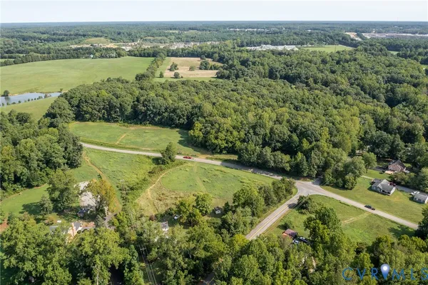 a view of a lake with a yard