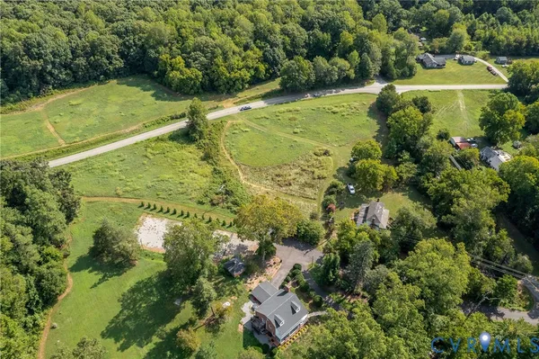 a view of a garden with houses