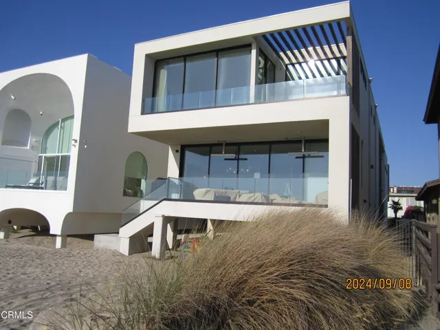 a front view of a house with balcony