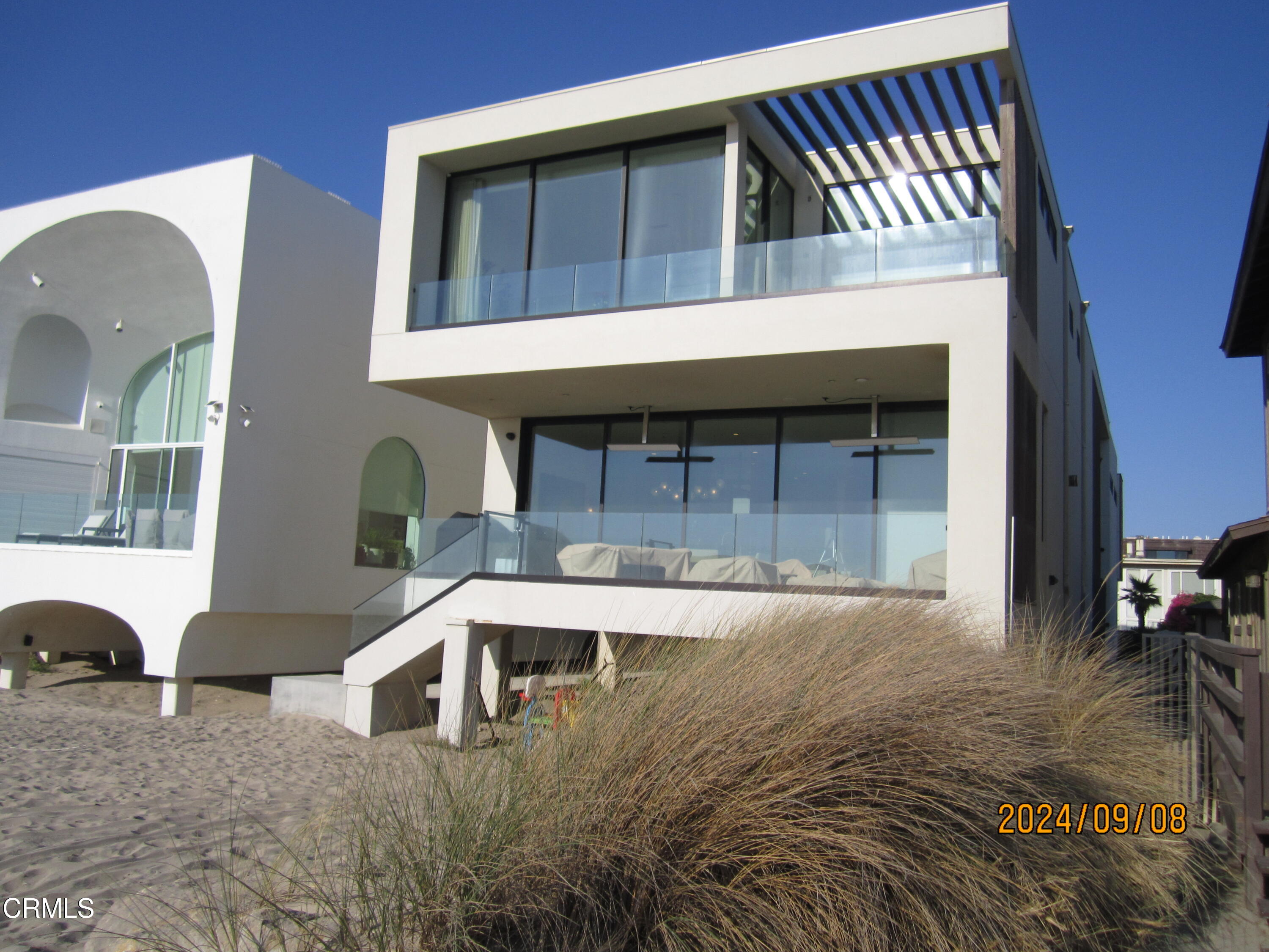 1215 Capri Way Oxnard, CA 93035 - Photo 2 of 2 a front view of a house with balcony