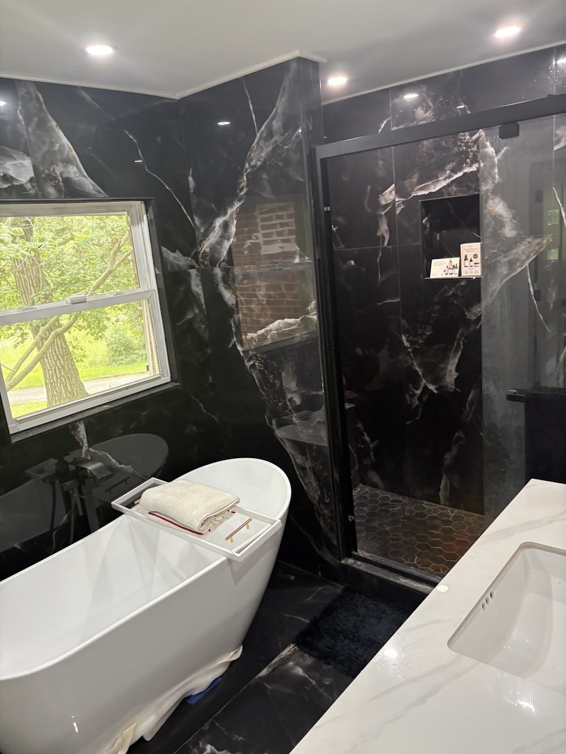 23000 Sherman Road Steger, IL 60475 - Photo 8 of 8 a bathroom with a sink a toilet a mirror and shower