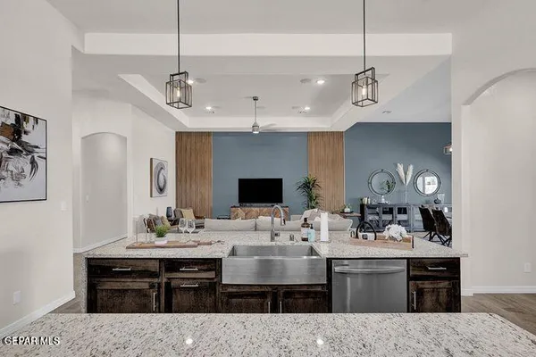 a view of dining room and kitchen island