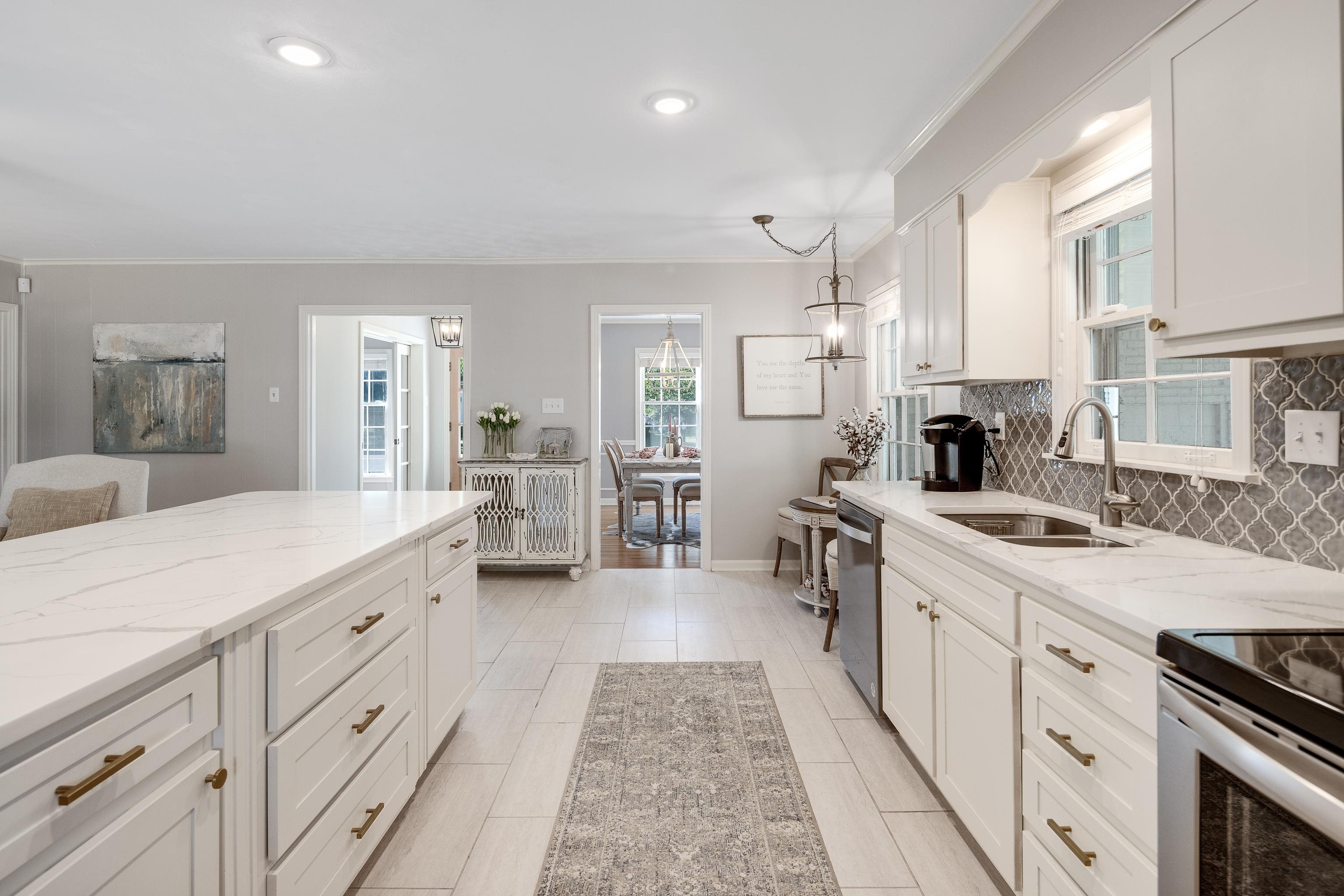 5060 Rich Road Memphis, TN 38117 - Photo 11 of 25 a large kitchen with cabinets