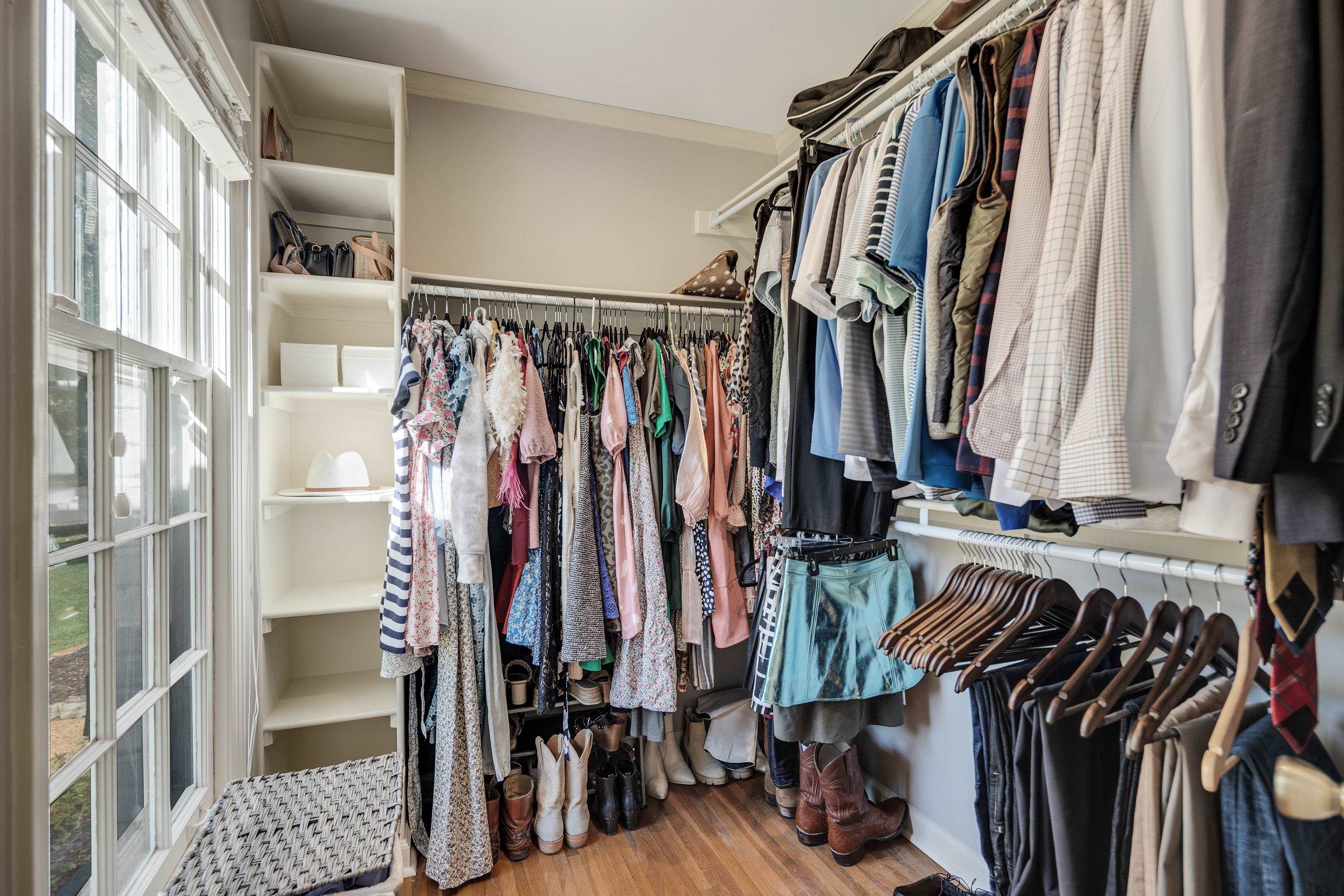 5060 Rich Road Memphis, TN 38117 - Photo 16 of 25 a view of walk in closet with clothes and shoes