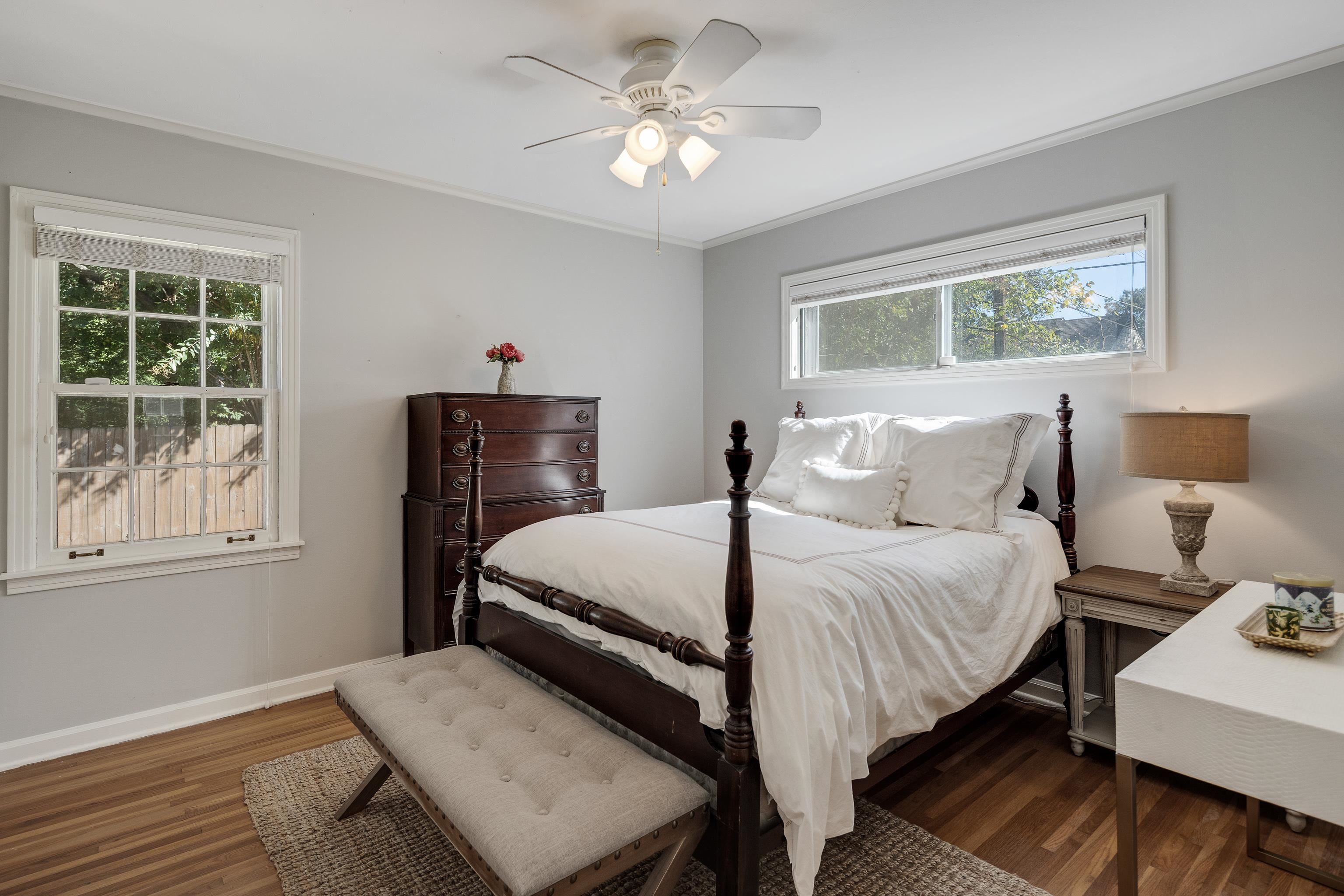 5060 Rich Road Memphis, TN 38117 - Photo 18 of 25 a bedroom with a bed and a window with chair