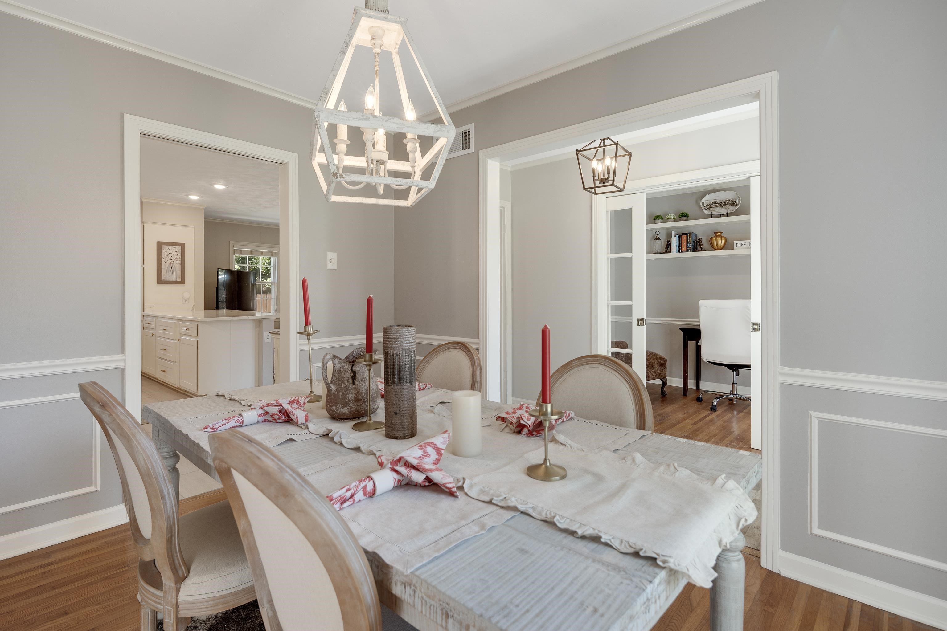 5060 Rich Road Memphis, TN 38117 - Photo 5 of 25 a dining room with furniture and a chandelier