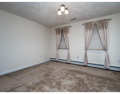 151 Groton Road Chelmsford, MA 01863 - Photo 15 of 29 an empty room with cabinet and stairs