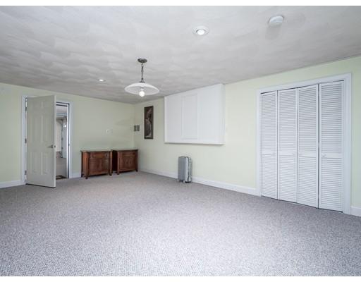 151 Groton Road Chelmsford, MA 01863 - Photo 20 of 29 an empty room with chandelier fan and windows