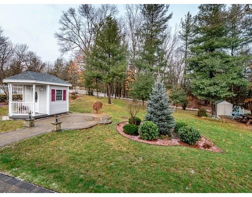 151 Groton Road Chelmsford, MA 01863 - Photo 25 of 29 a view of a house with backyard and sitting area