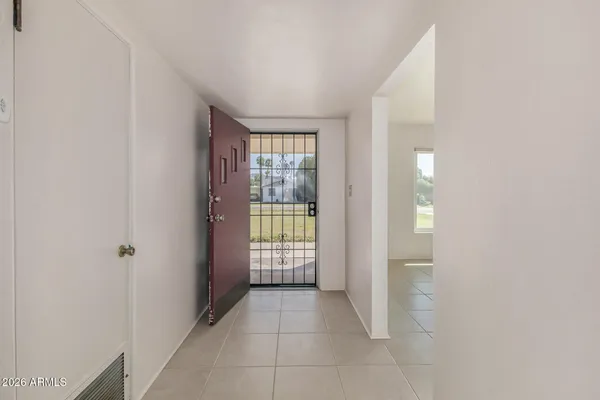 a kitchen with stainless steel appliances a stove a sink and a refrigerator