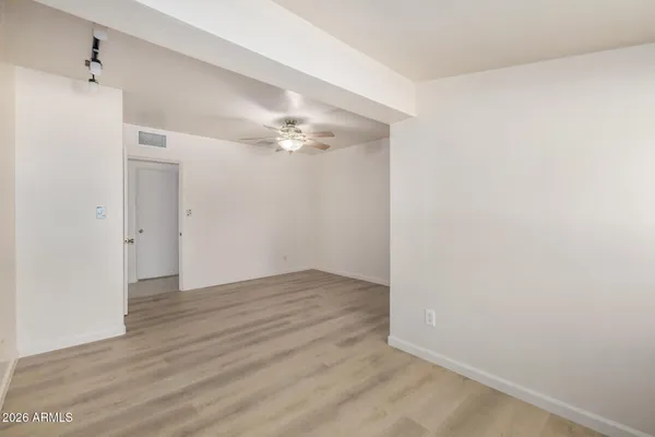 a view of an empty walk in closet