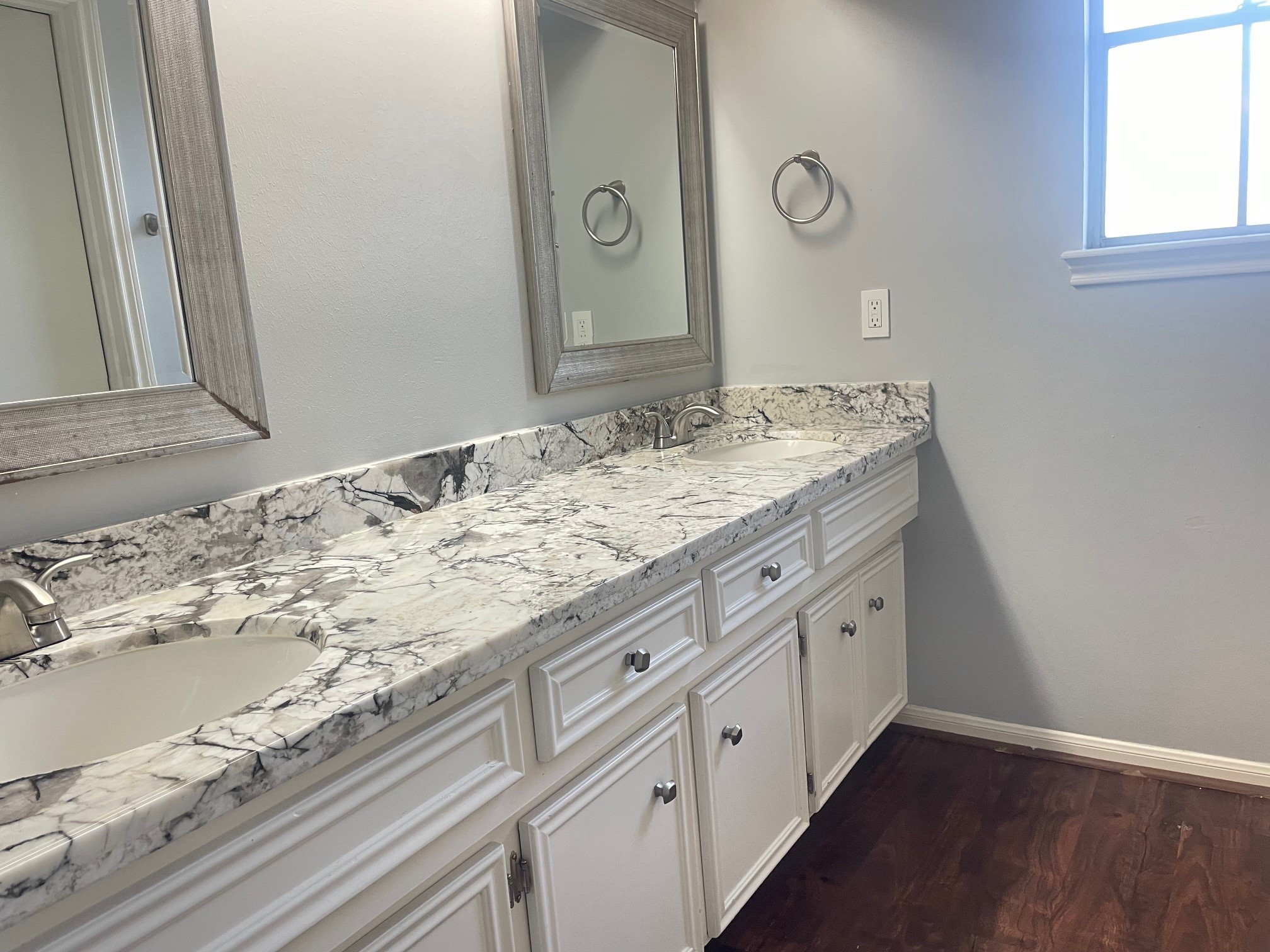11310 Meadow Lake Drive Houston, TX 77077 - Photo 11 of 16 a bathroom with a granite countertop sink and a mirror