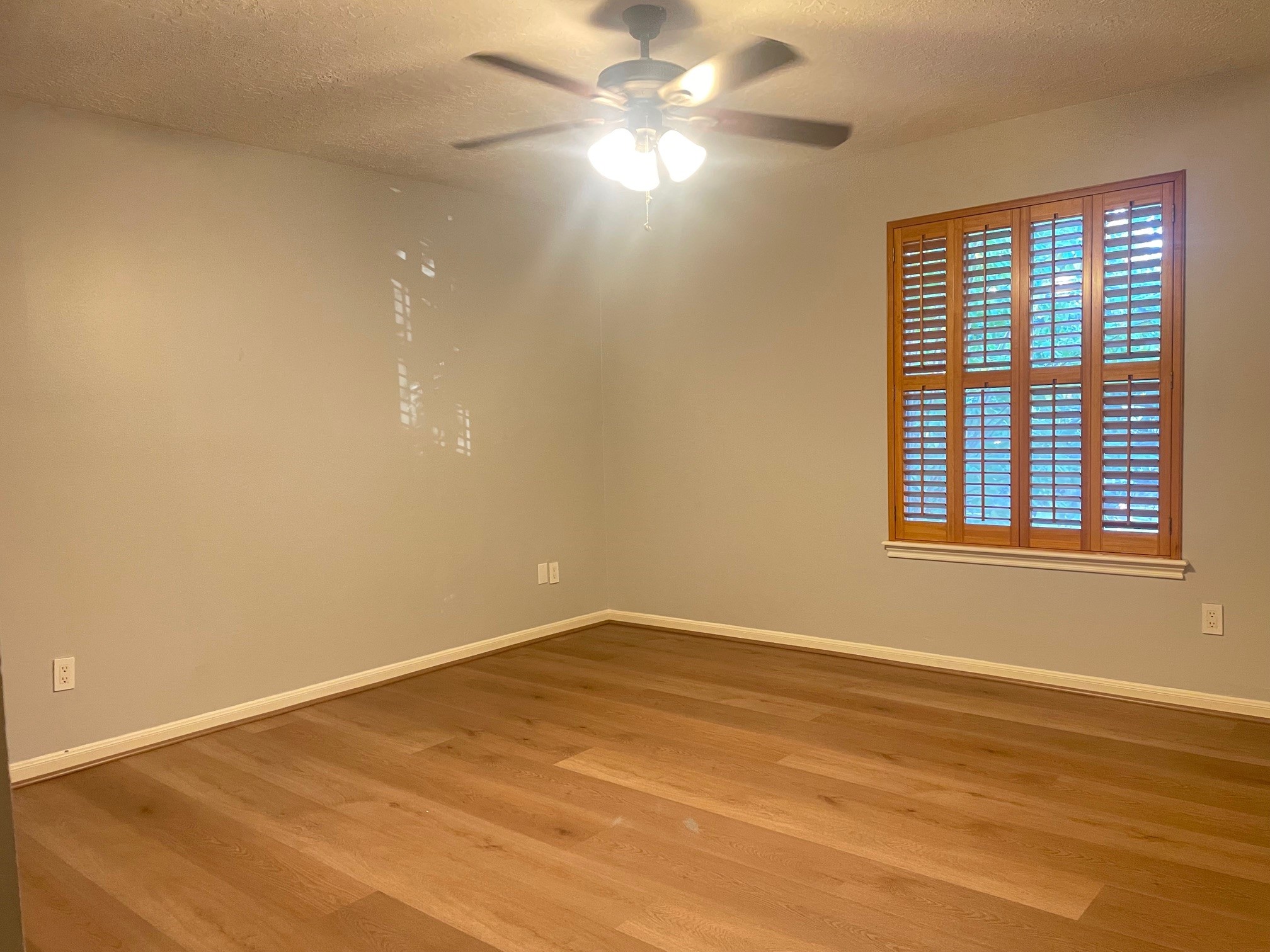 11310 Meadow Lake Drive Houston, TX 77077 - Photo 8 of 16 a view of an empty room with a window