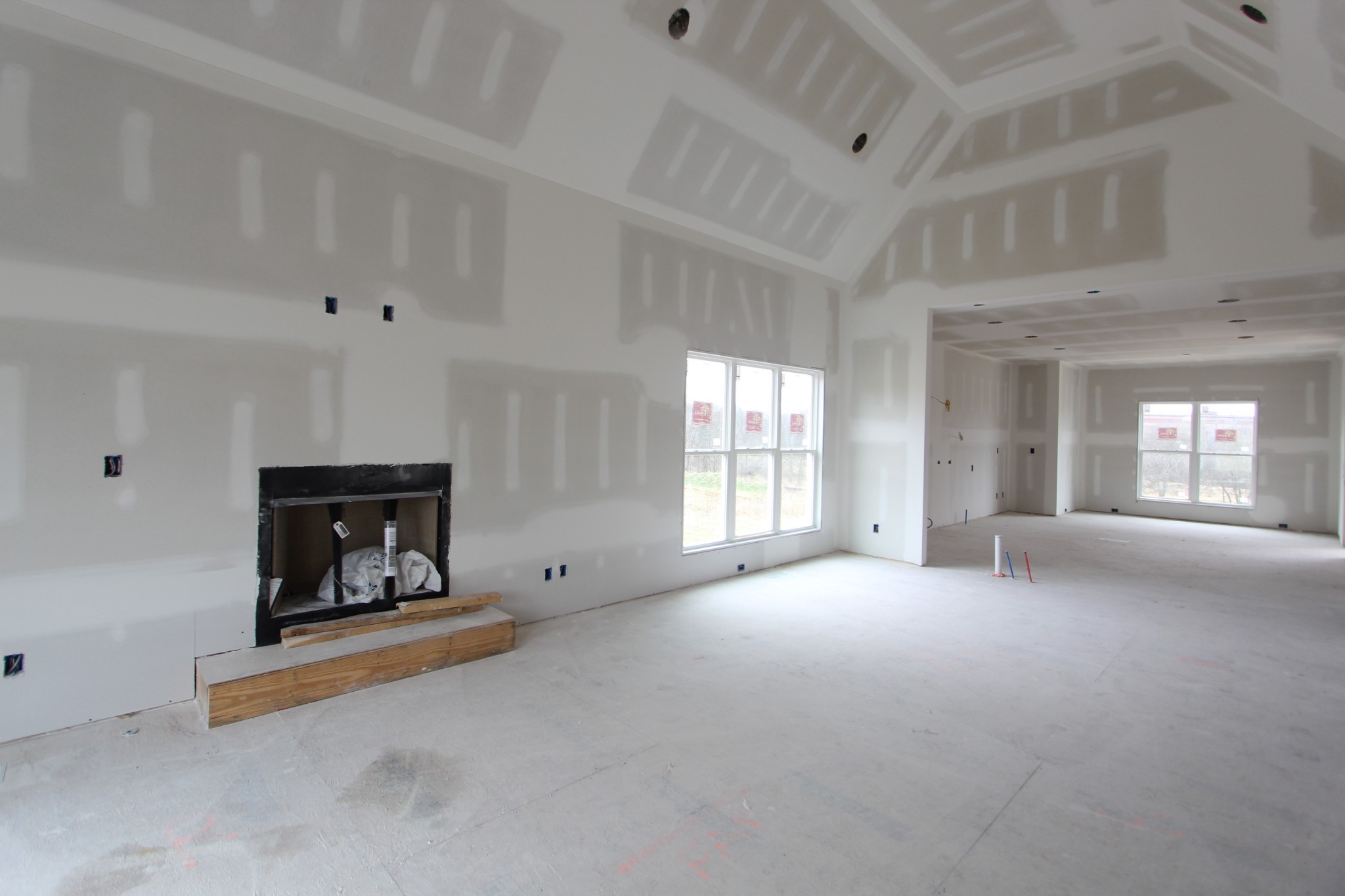 484 Cole's Ferry Road, Unit 3C Gallatin, TN 37066 - Photo 5 of 10 a view of an empty room with a fireplace and a window