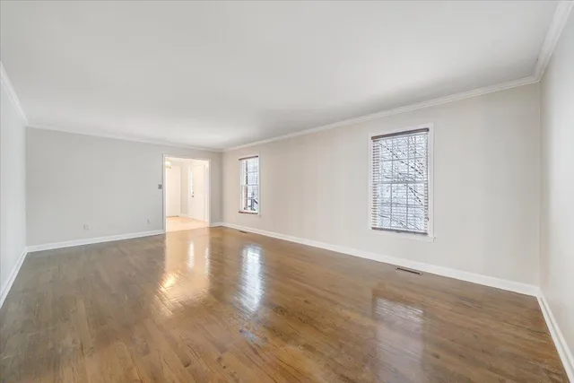 a view of empty room with fireplace