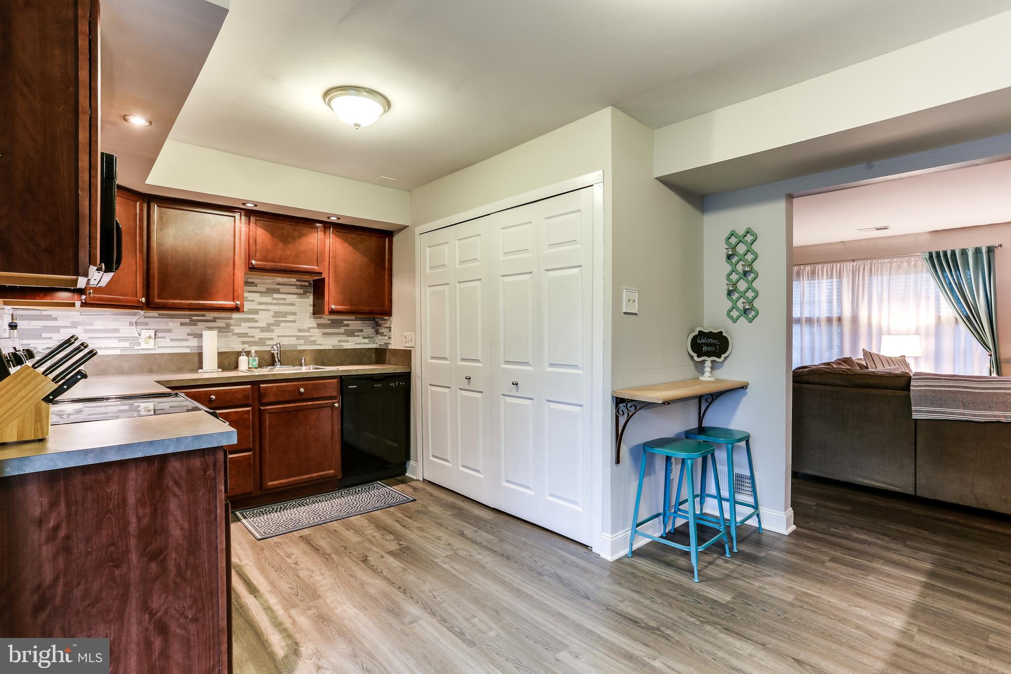 7894 Chalice Road Severn, MD 21144 - Photo 10 of 30 Bright Kitchen w/ Sliders to Rear Patio