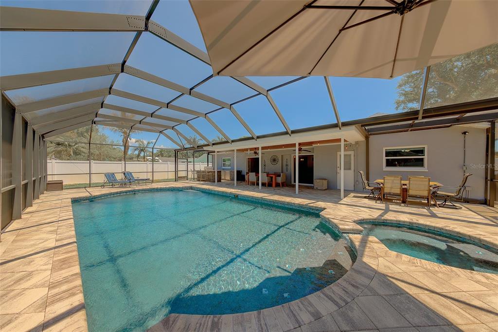 9628 122nd Way Seminole, FL 33772 - Photo 29 of 53 a view of a backyard of a house