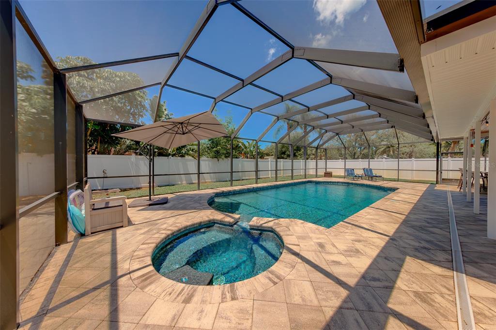 9628 122nd Way Seminole, FL 33772 - Photo 30 of 53 a view of a swimming pool with a patio