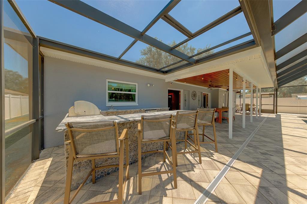 9628 122nd Way Seminole, FL 33772 - Photo 32 of 53 a view of a dining room with furniture