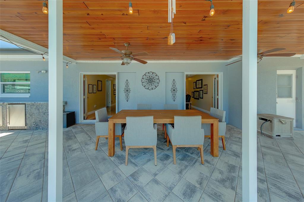 9628 122nd Way Seminole, FL 33772 - Photo 36 of 53 a view of a room with table and chairs