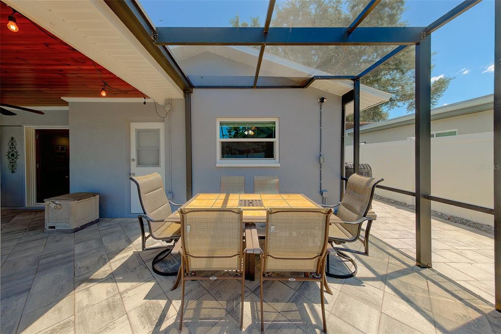 9628 122nd Way Seminole, FL 33772 - Photo 38 of 53 a view of a dining room with furniture and wooden floor