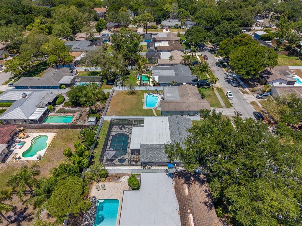 9628 122nd Way Seminole, FL 33772 - Photo 43 of 53 an aerial view of a house with yard swimming pool and outdoor seating